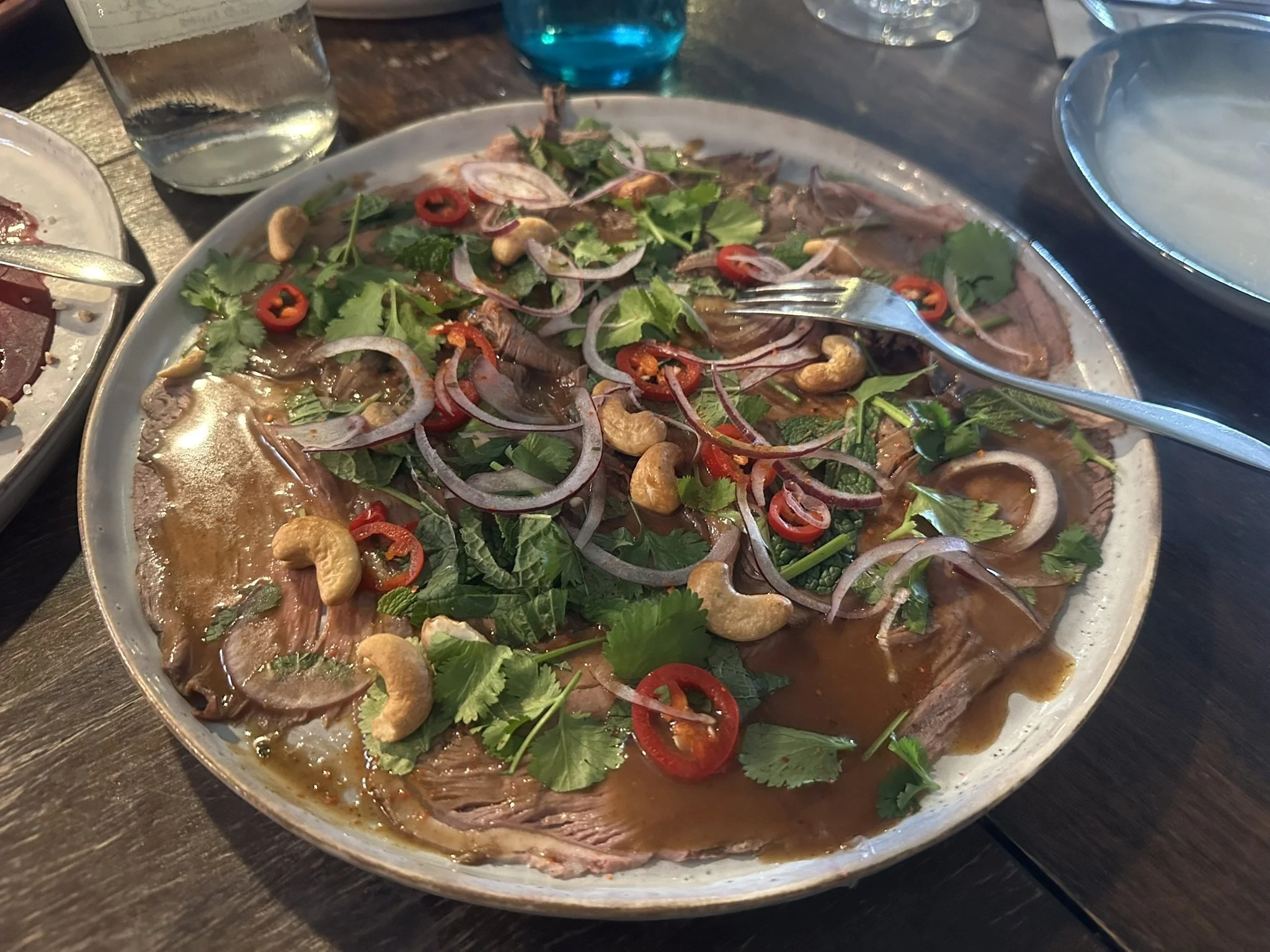 A shared plate on the table at a wine dinner