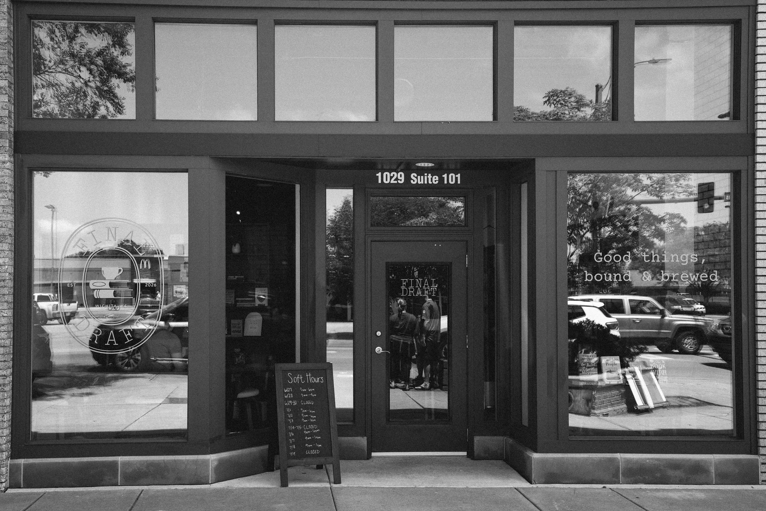Black and white photo of the front of the building for Final Draft bookstore, coffee shop & bar