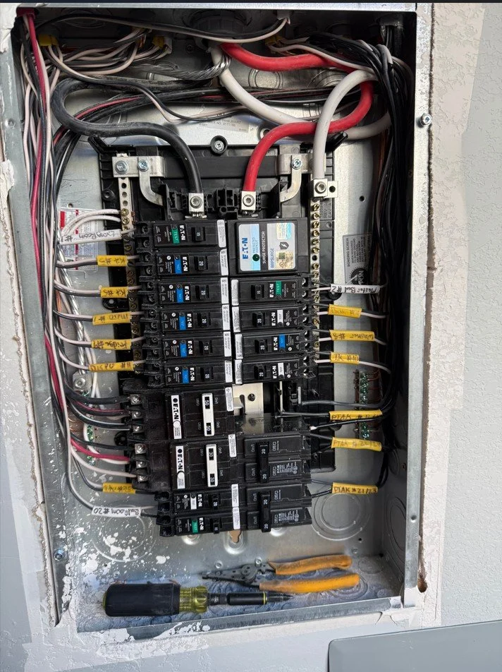 Residential electrical panel with breakers and wiring