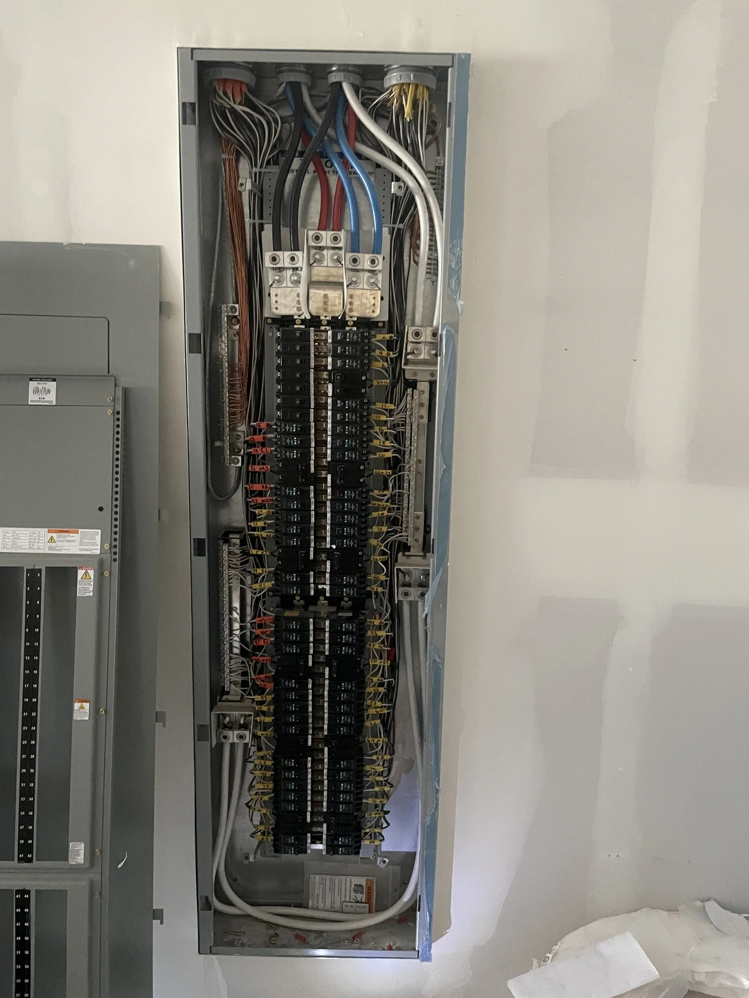 Residential electrical panel with breakers and wiring