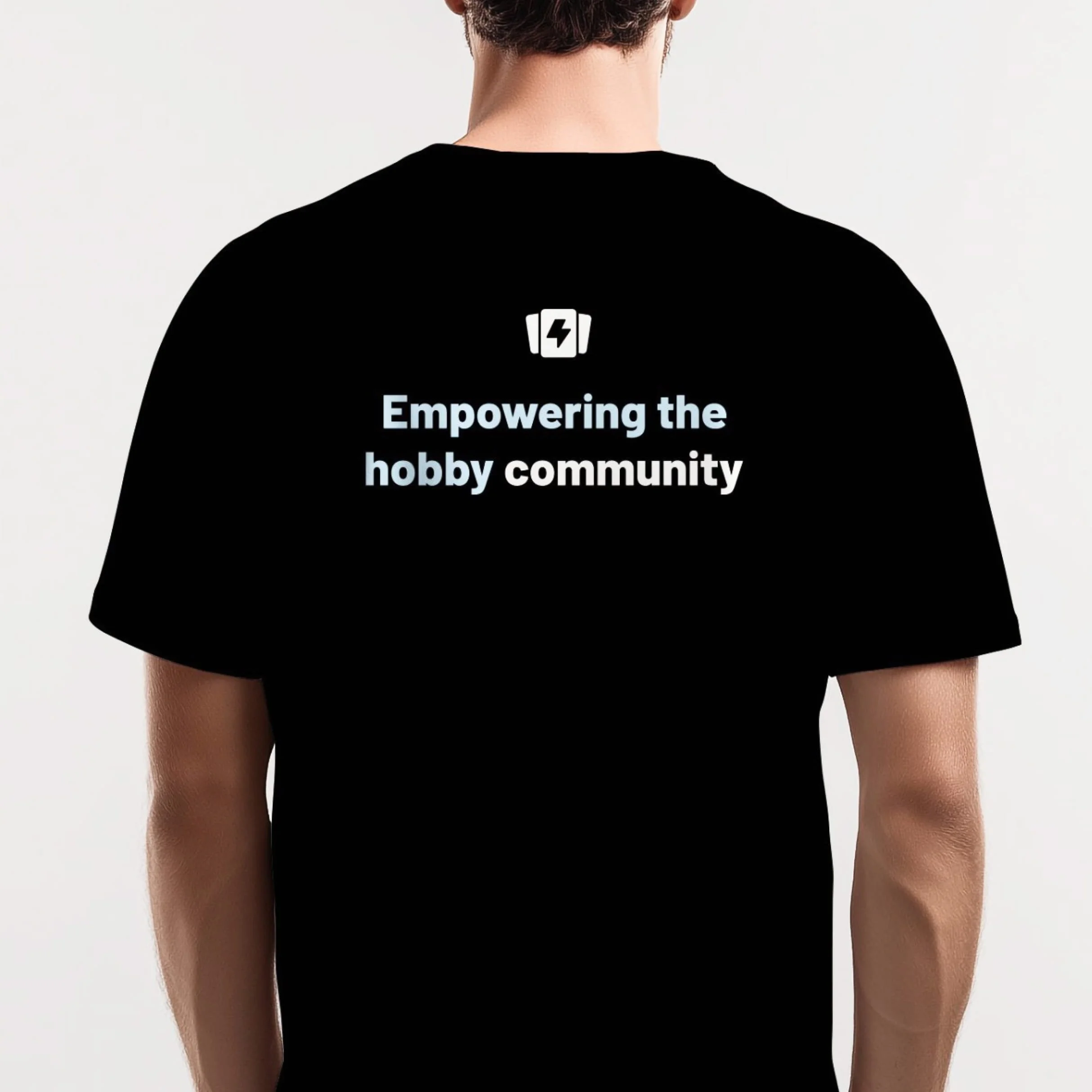 Black t-shirt with TCGplayer bolt symbol and text that reads 'Empowering the hobby community' on the back.
