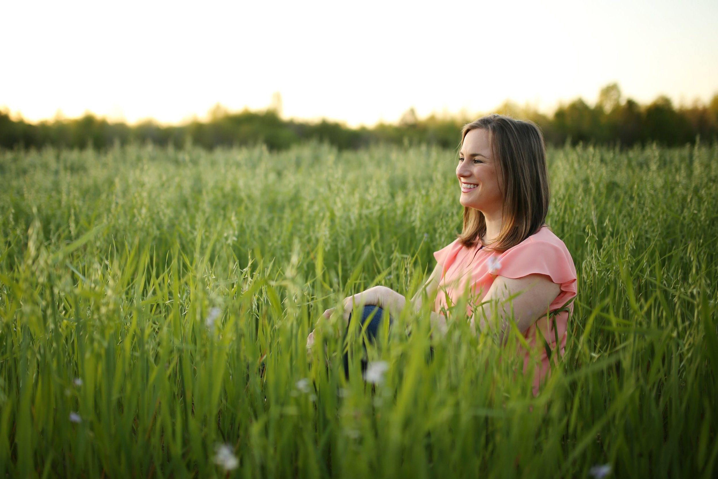 Laura Long sitting outdoors