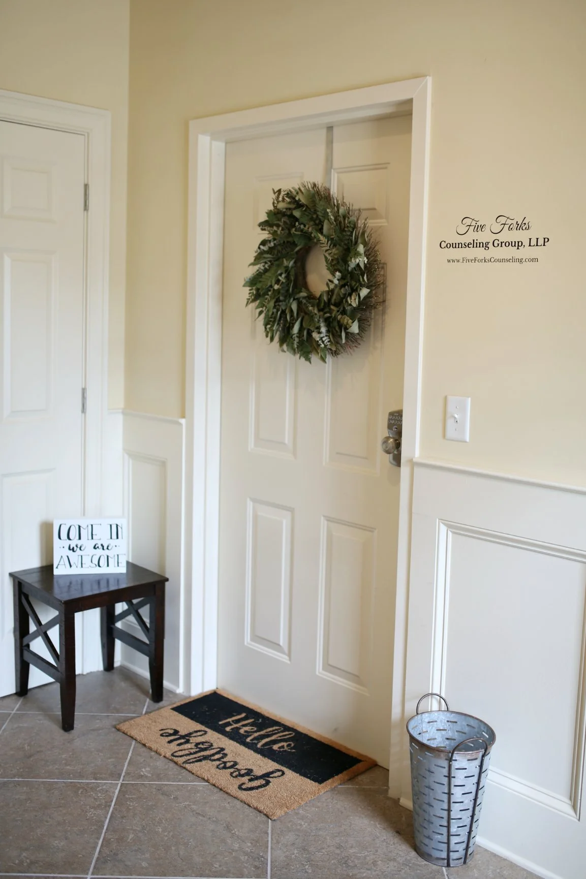 Entrance to Five Forks Counseling Group with a wreath on the door