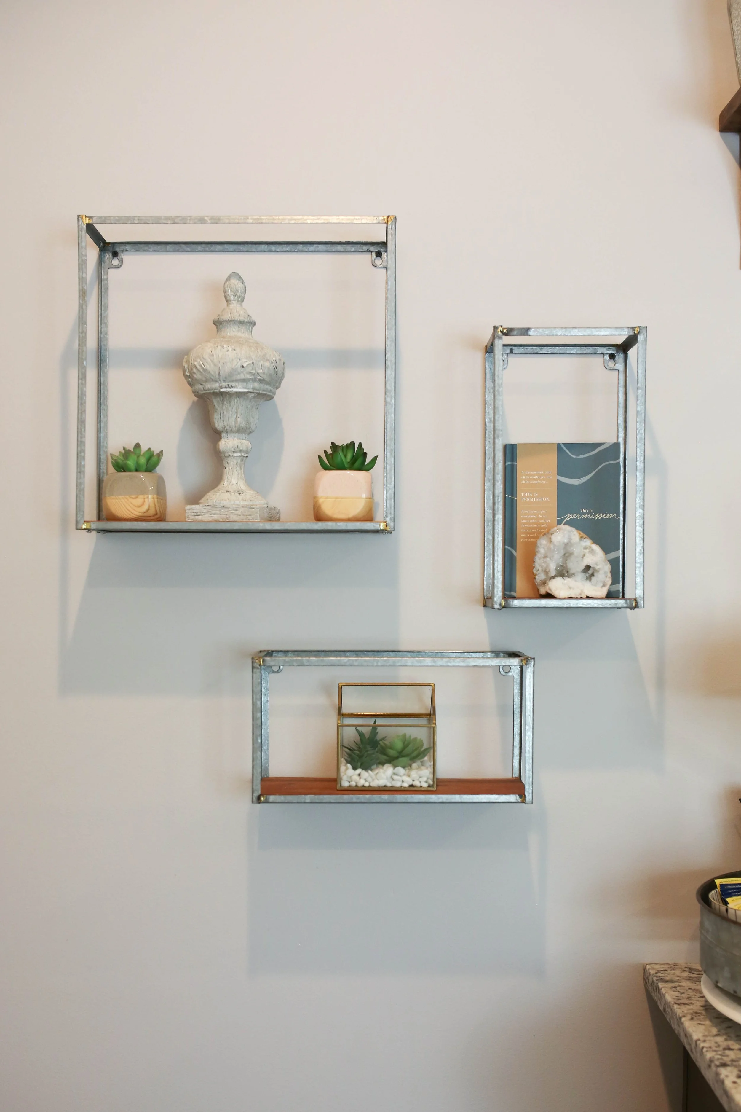 Shelf and decor in Laura Long’s therapy office