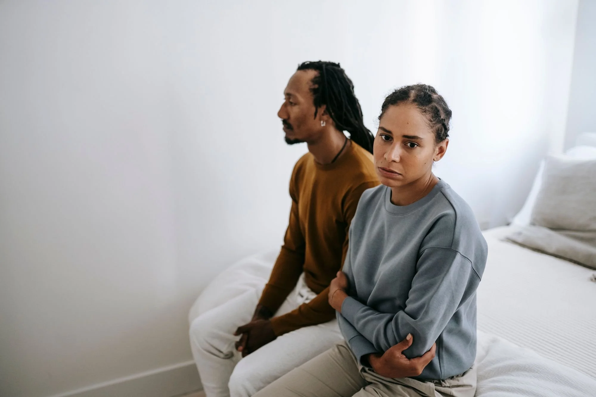 Two people sitting in a stressful moment