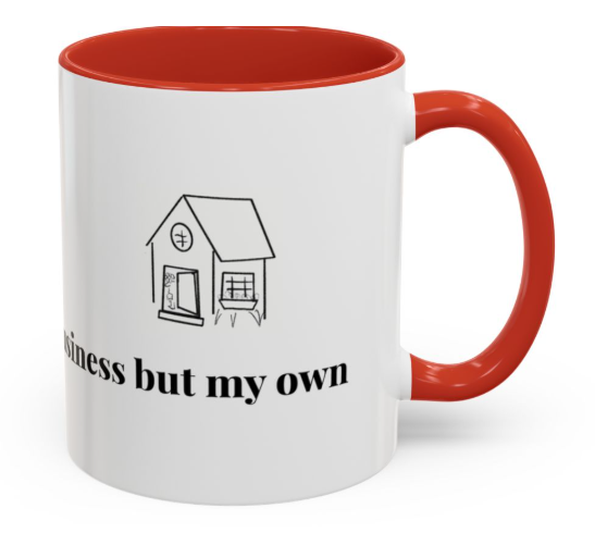 White mug with red interior and handle, featuring a simple drawing of a house and partial black text reading "-ness but my own."