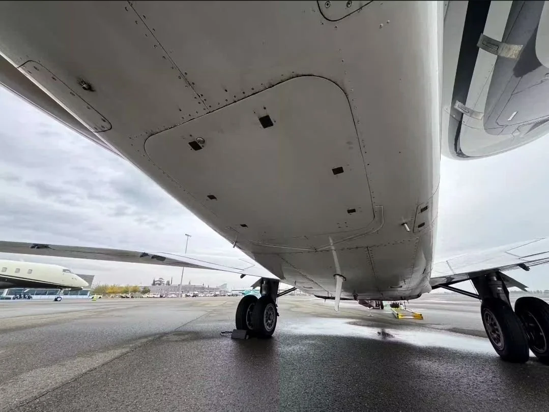 Underside of a private aircraft during professional exterior detailing in Vancouver, WA and Portland, OR