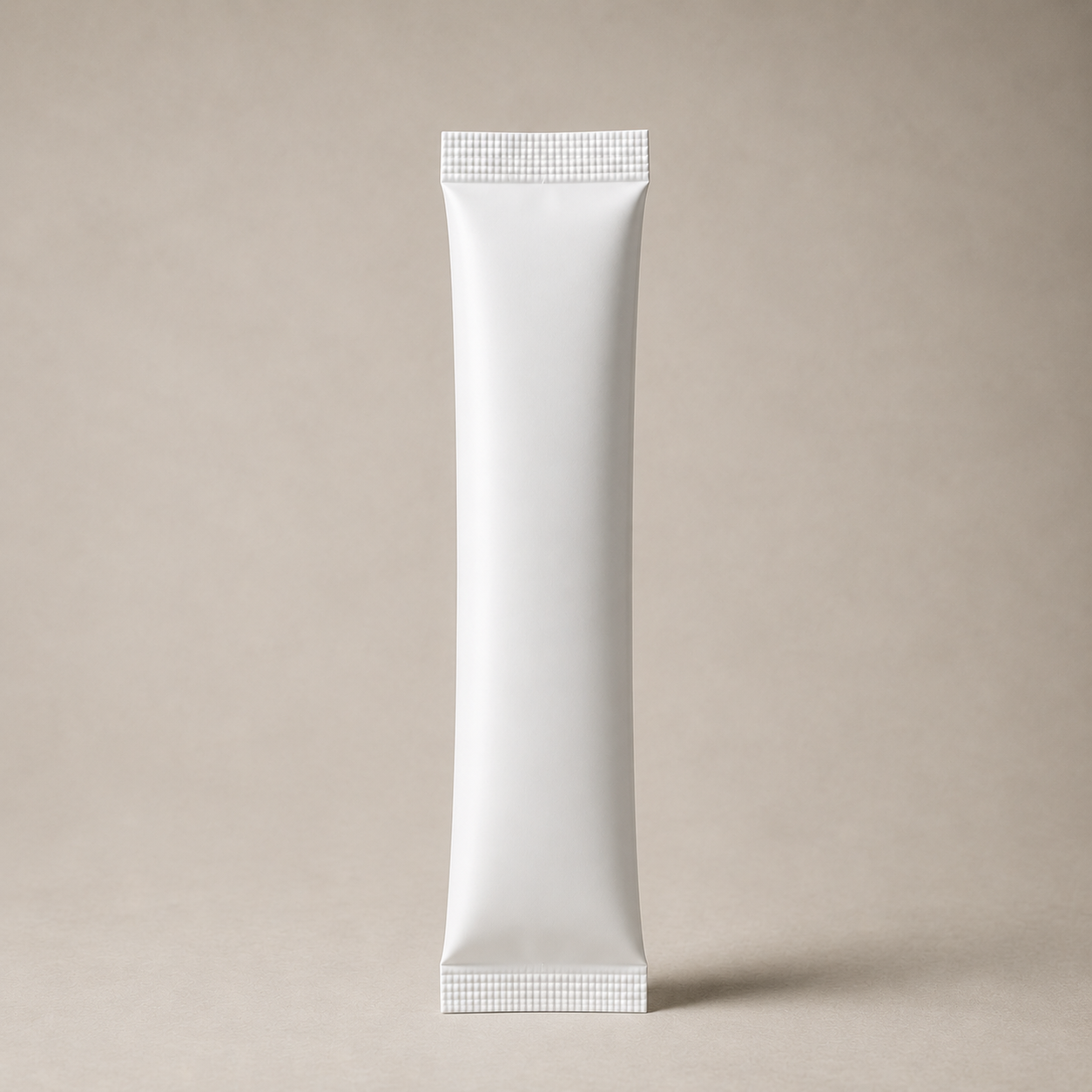 Blank white tube standing upright on a beige background.