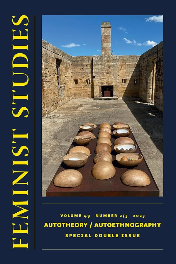 Cover of a magazine titled 'Feinstein Studies', Volume 49, Number 2/3, 2023, featuring a photograph of an outdoor stone structure with a chimney and a flat surface with various stones and bowls in the foreground.