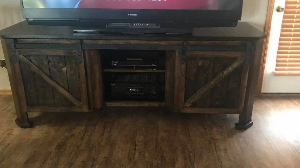 Custom rustic barn-door TV console handcrafted by CAB Construction