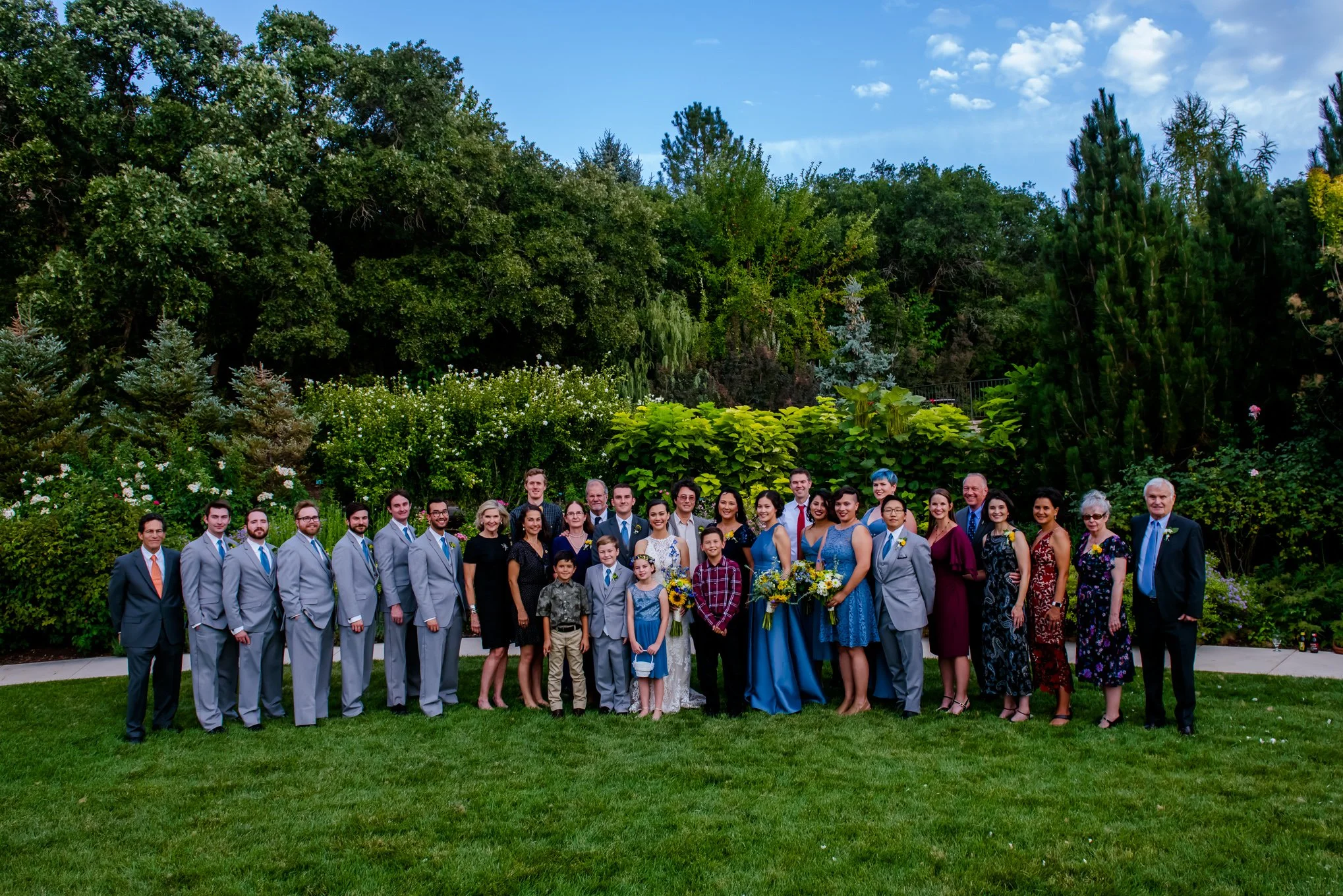 Large group photo at a Red Butte Garden wedding in summer