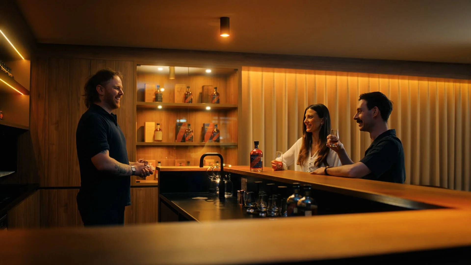 People enjoying a dram at Sullivans Cove Distillery