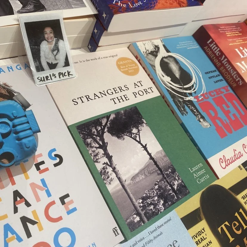 95bFM's Loose Reads: Strangers at the Port by Lauren Aimee Curtis