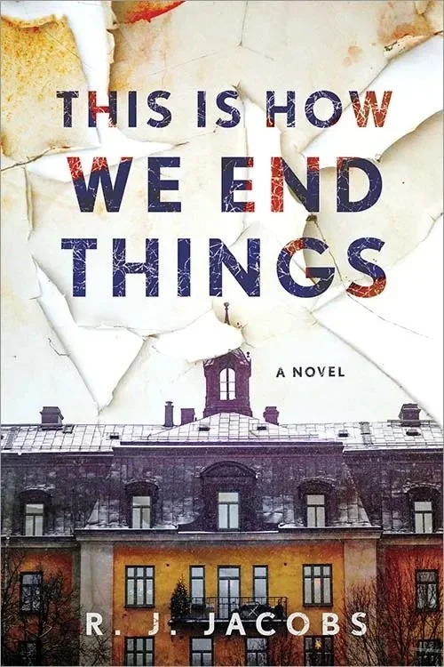 Book cover titled 'This Is How We End Things' by R. J. Jacobs, featuring a torn paper effect revealing a building with a turret and yellow-orange lower walls.