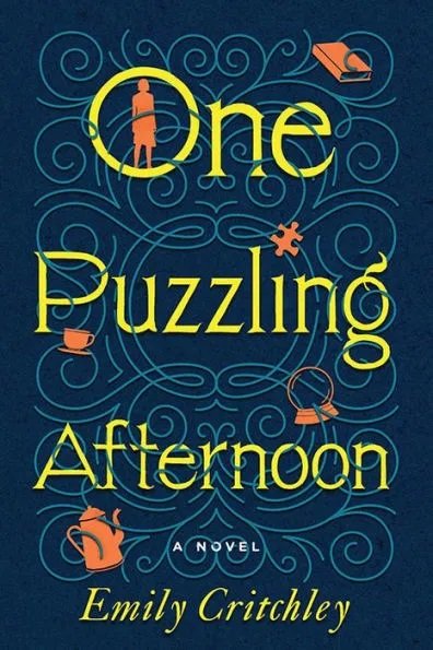 Book cover titled 'One Puzzling Afternoon' by Emily Critchley with the subtitle 'A Novel.' The cover features a navy blue background with yellow-green lettering, and various puzzle pieces and an eye illustration.