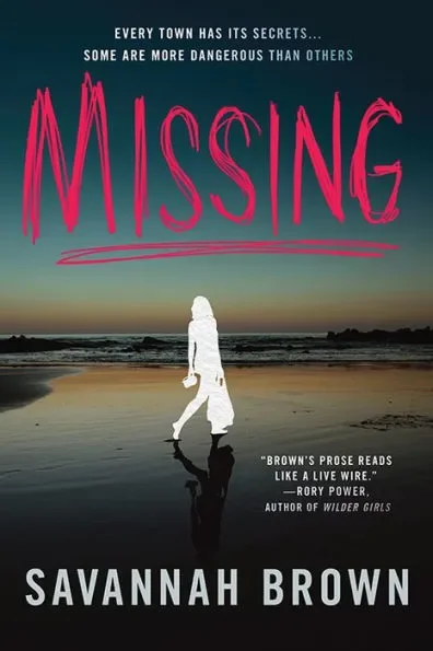 Book cover of 'Missing' by Savannah Brown featuring a solitary woman walking on the beach during sunset with a colorful sky, large pink handwritten title, and a quote about suspense.