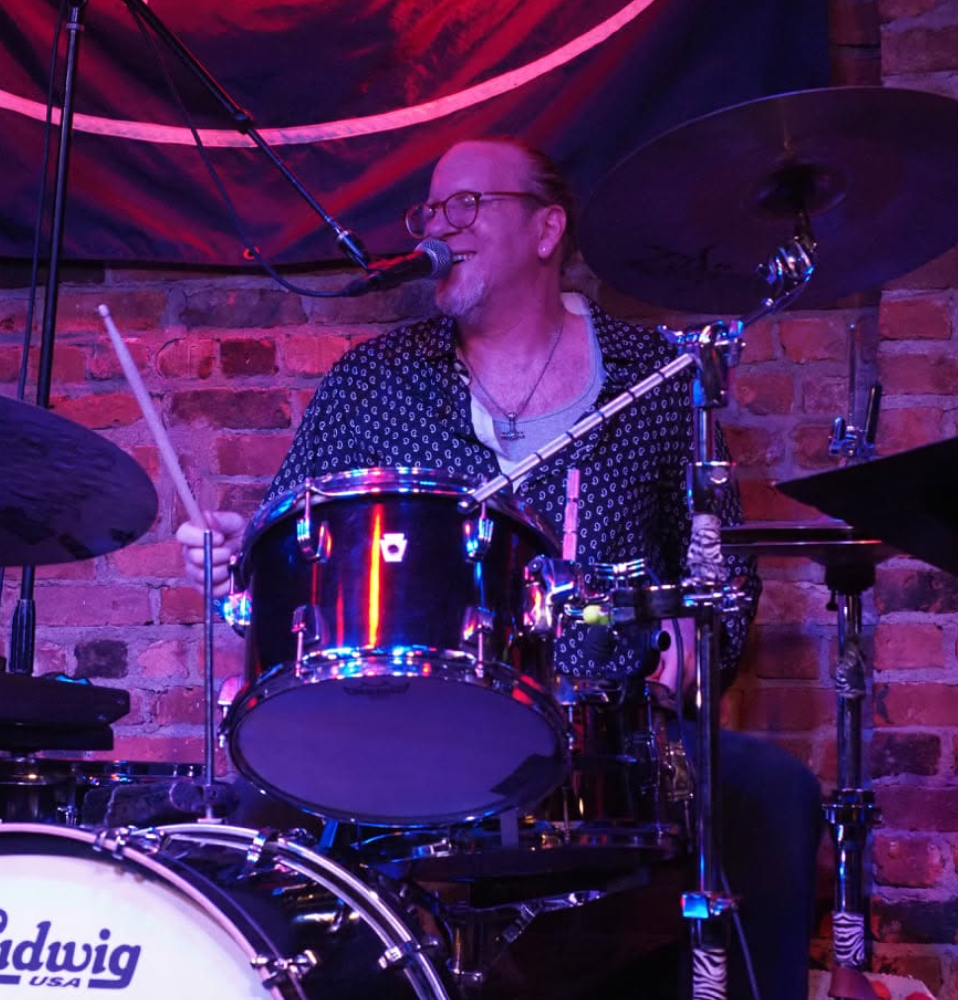Red House Music and Rehearsal Studio instructor, David Moore, performs on stage. Dave teaches drums in Point Pleasant, NJ. 