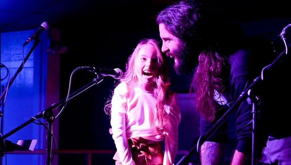 Student and Instructor: Peyton Quinn and Erik Reynolds perform at Headliner 