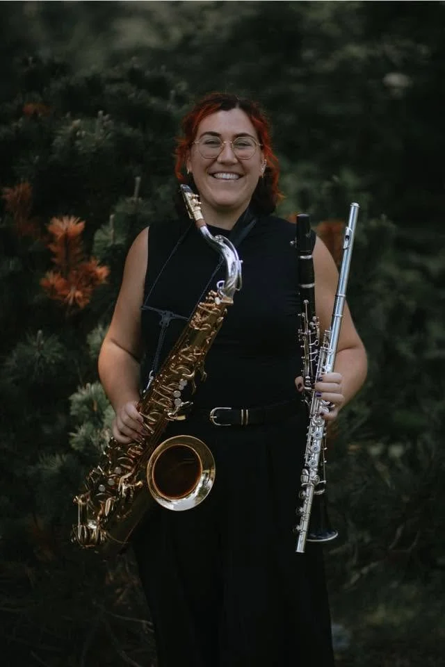 Red House Music and Rehearsal Studio instructor, Tessa O'Boyle, poses with two of her three primary instruments, saxophone and flute. Tessa also teaches clarinet in Point Pleasant, NJ and performs regularly with Remember Jones. 