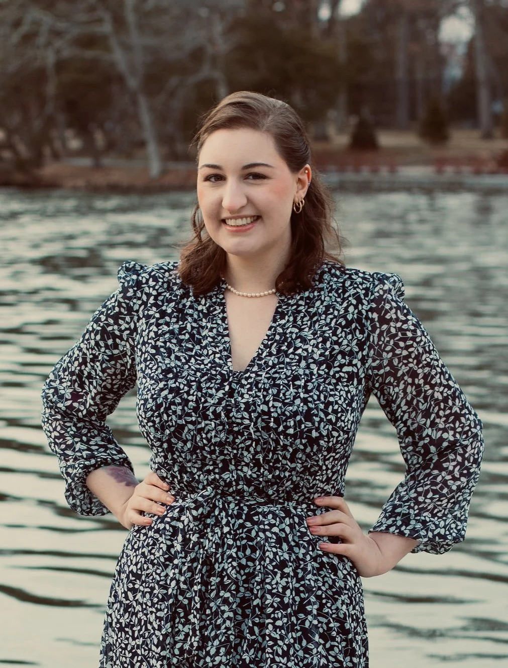 Red House Music and Rehearsal Studio administrative professional, Nicole Owenburg, poses for a professional headshot. 