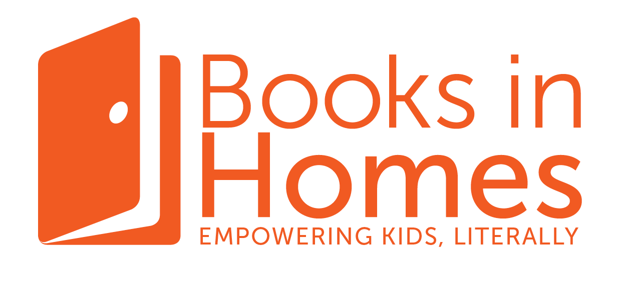 Logo of Books in Homes featuring an orange open book icon and the text "Books in Homes" with the tagline "Empowering Kids, Literally".