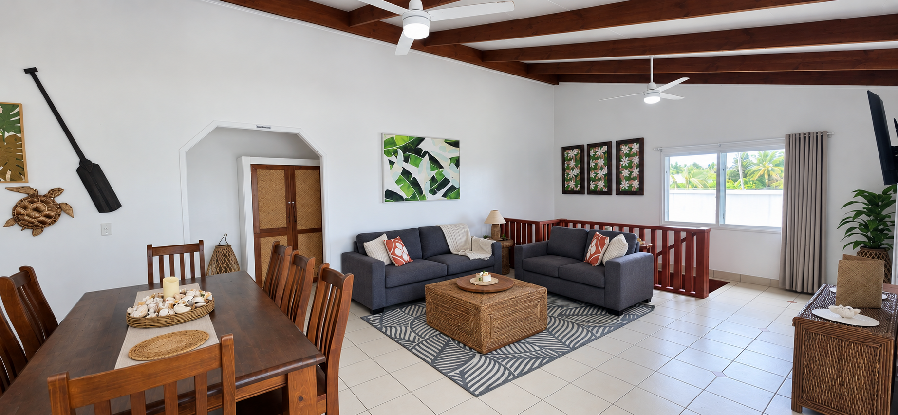 Spacious open-plan living area at Arorangi Sunset Beach House