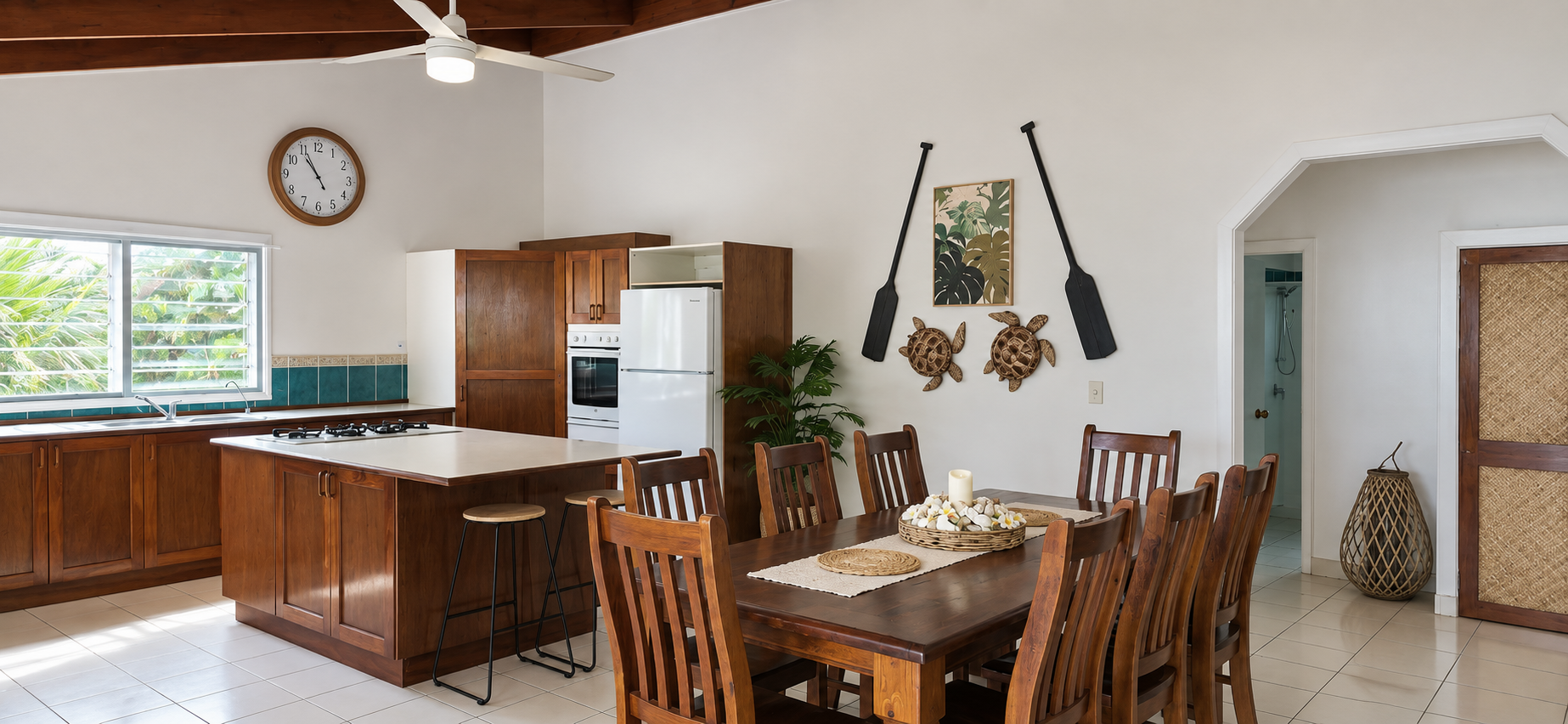Fully equipped kitchen and dining area at Arorangi Sunset Beach House