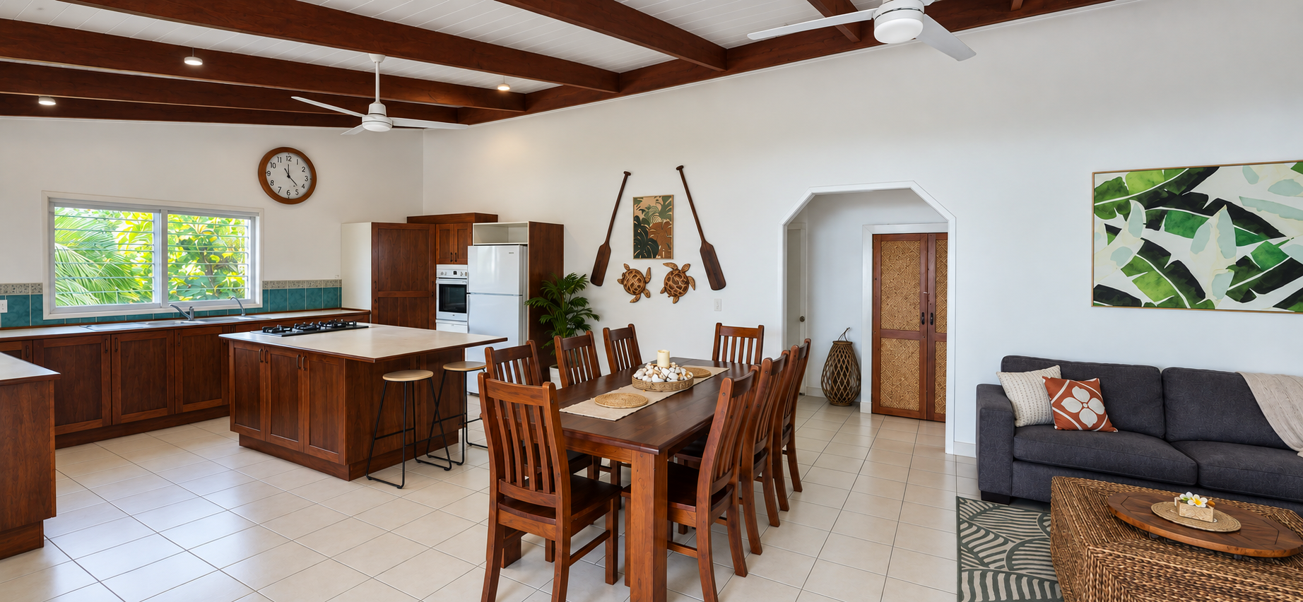 Fully equipped kitchen and dining area at Arorangi Sunset Beach House