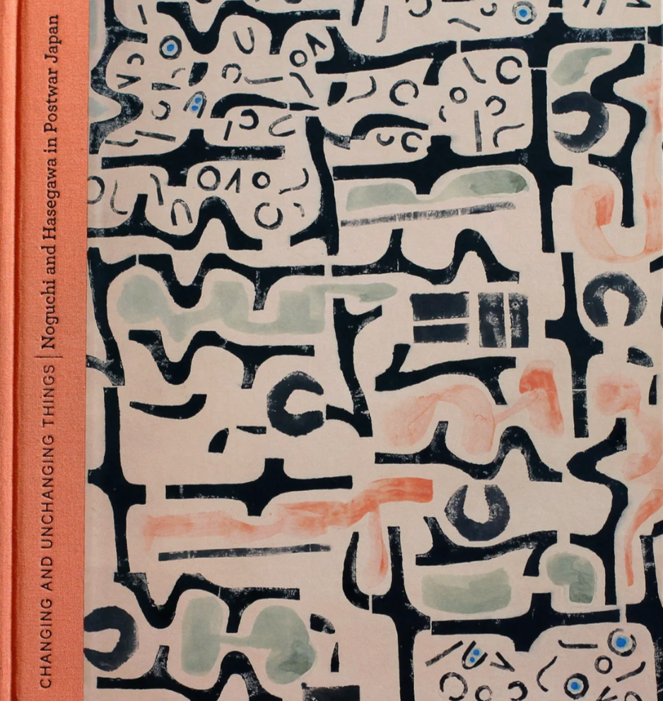 A book cover with abstract black lines and shapes on a neutral background, orange vertical spine on the left with text.