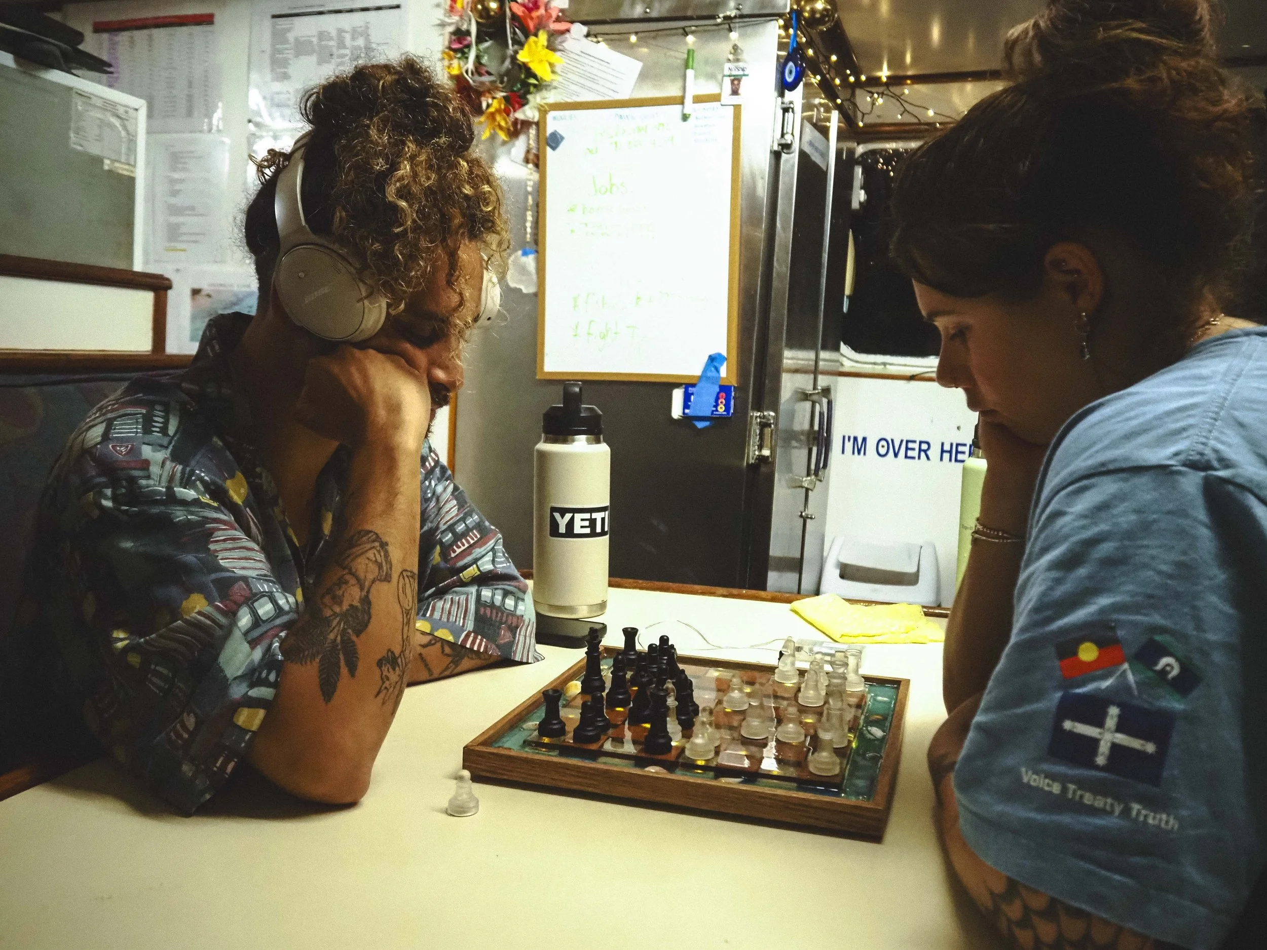  A game of chess offers some mental stimulation to balance out the hard physical work. 