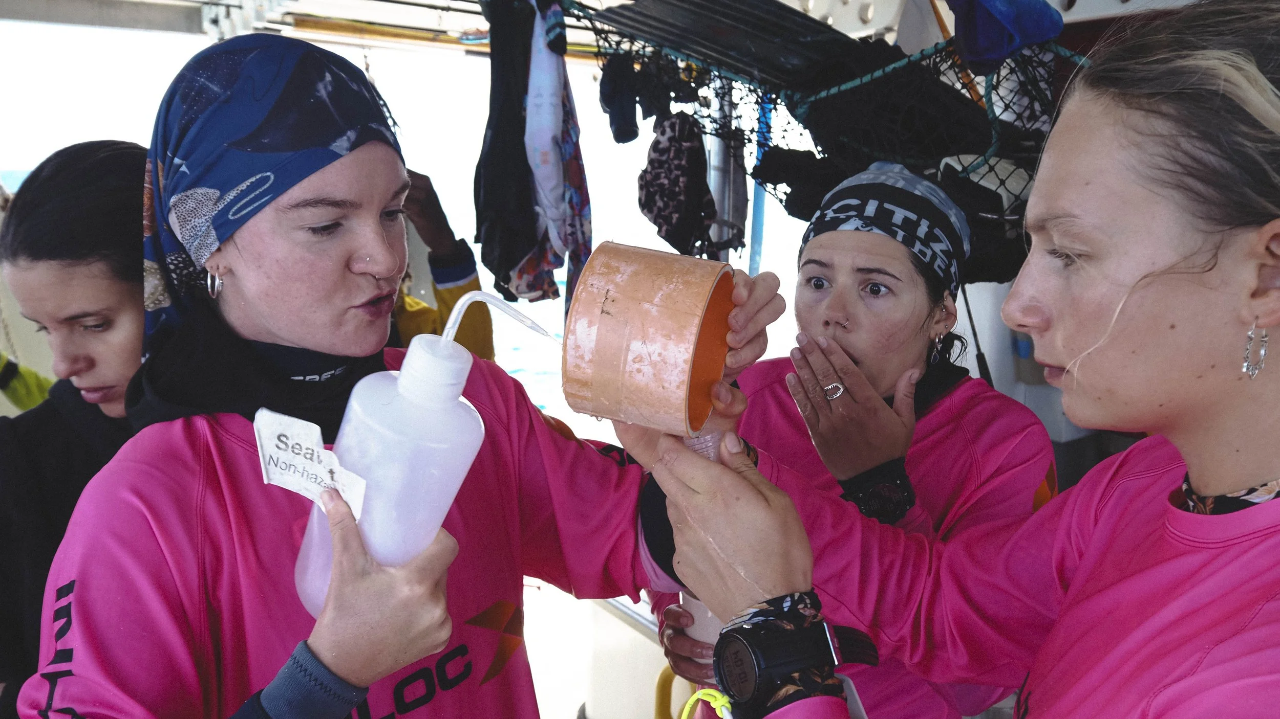  The crew having fun processing water samples before they’re sent to the research station to determine the number of COTS larvae in the water column. Everyday life on a boat is serious enough! 
