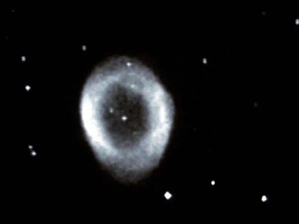 M57. Note central star and others easily visible.