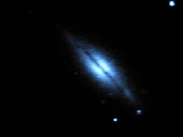NGC 5866. Dust lane enjoyed from 10 feet away sitting in my lawn chair.