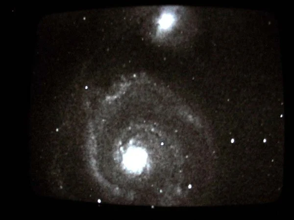 M51. Much better view on the monitor than the photo shows. H2 regions, bridge to satalite galaxy, dust lanes etc are all spectacular live.