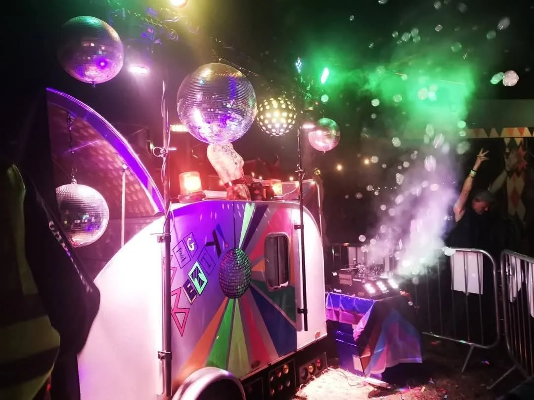 Tear drop caravan named Betty, decorated with disco balls and lighting