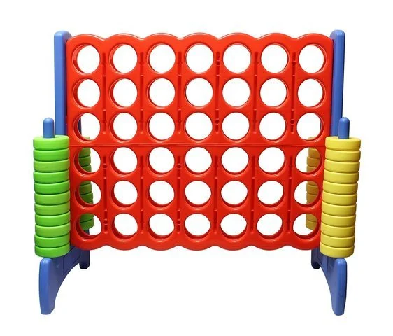 Colorful Connect Four game with red, blue, green, and yellow plastic pieces.