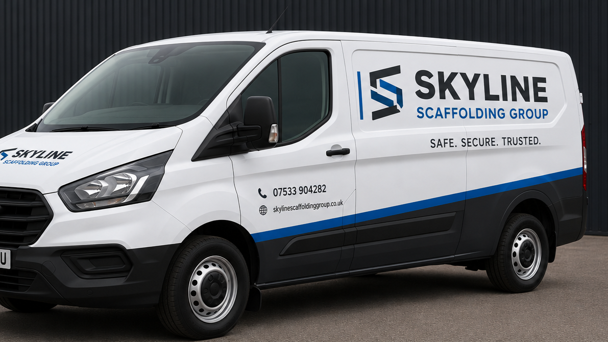 White van with Skyline Scaffolding Group logo and contact info parked in front of a black building.
