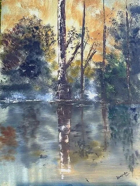 Title:
Reflections of Grace

Description:
Reflections of Grace captures a quiet moment where still waters mirror the beauty of the surrounding forest and the gentle light of a new day. Soft reflections and drifting mist invite the viewer to slow down