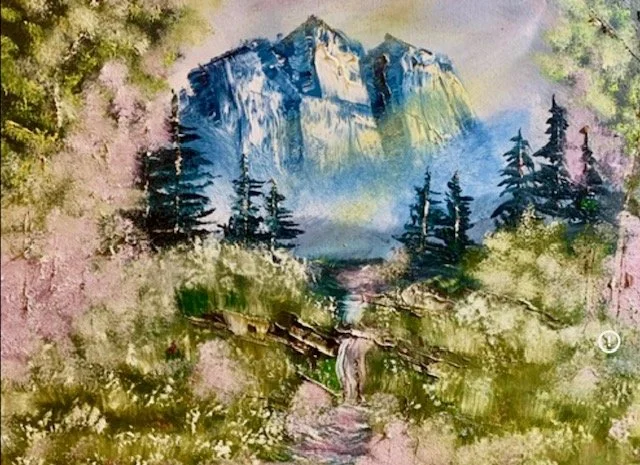Alpine Promise celebrates the quiet assurance found in the beauty of creation. Framed by wildflowers and evergreen forests, a crystal stream winds toward majestic alpine cliffs bathed in gentle light. The landscape invites the viewer to pause, breath