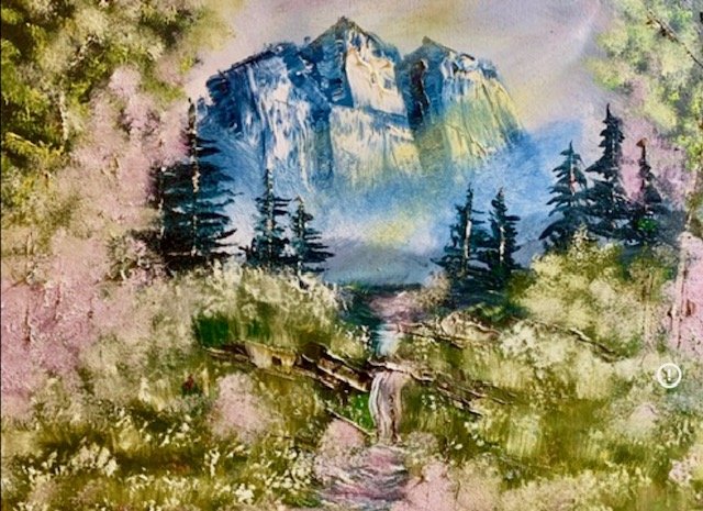 Title: 
Alpine Promise

Description:
Alpine Promise celebrates the quiet assurance found in the beauty of creation. Framed by wildflowers and evergreen forests, a crystal stream winds toward majestic alpine cliffs bathed in gentle light. The landscap