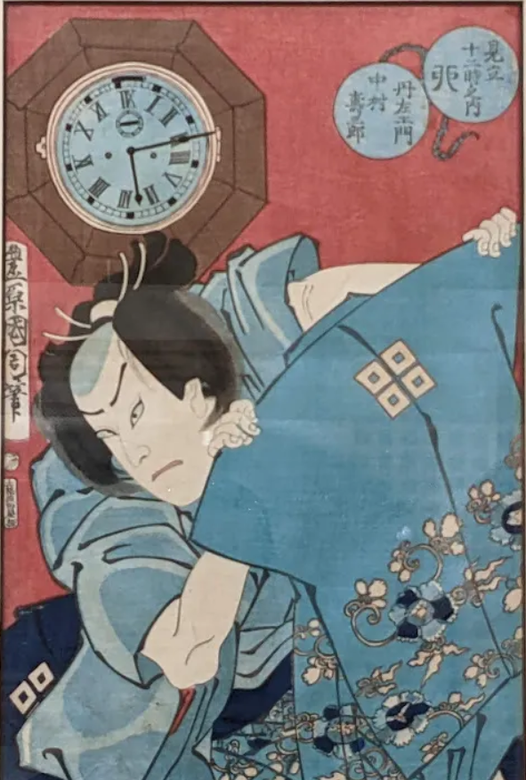 A traditional Japanese print depicting a person in blue clothing, lying on a bed with a clock on the wall behind them. The clock shows the time as approximately 3:09.