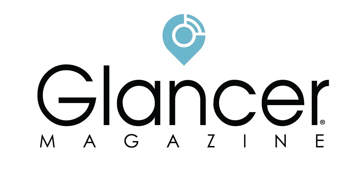 Glancr Magazine logo with a blue location pin icon above the text