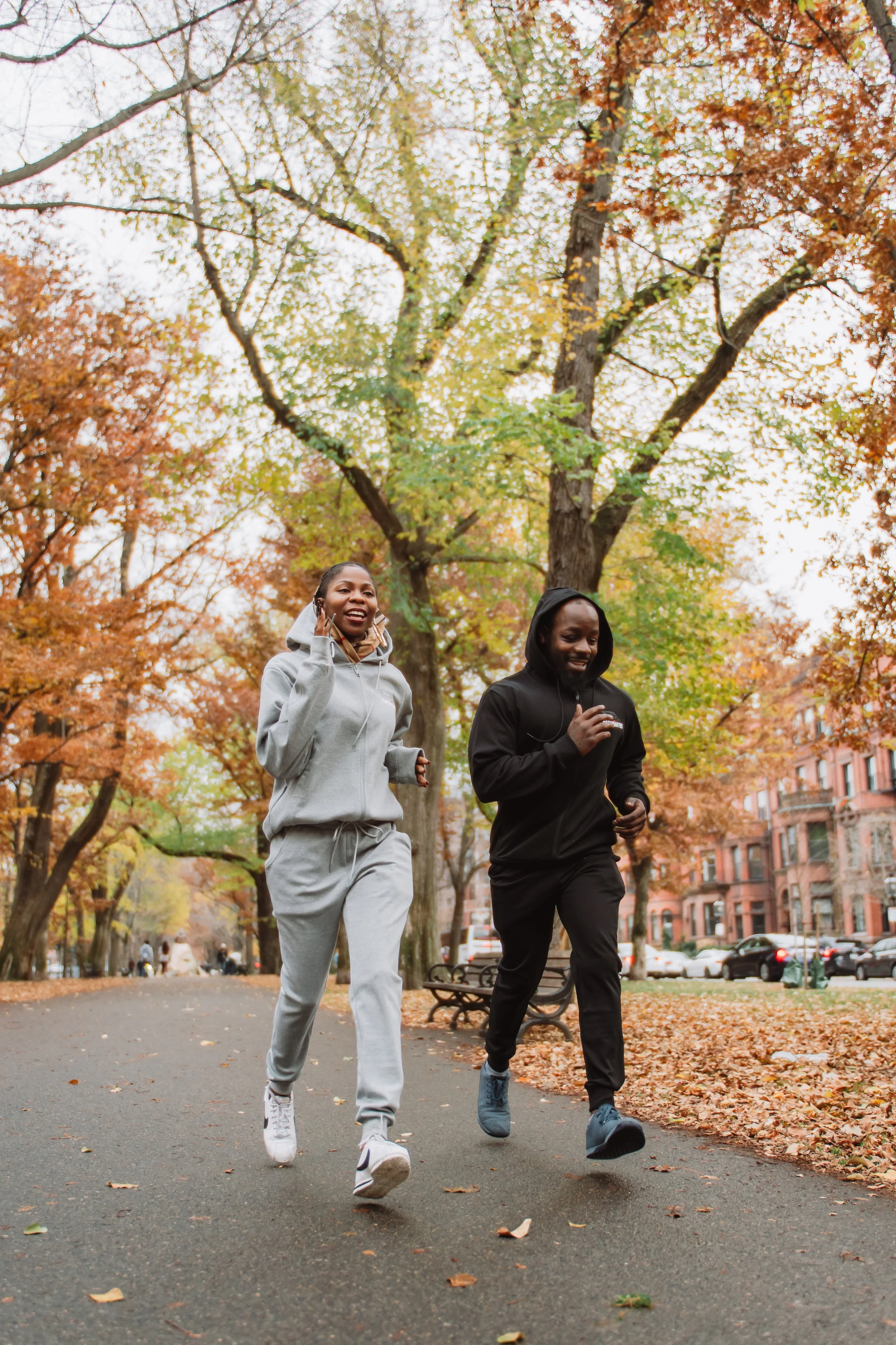 Man And women Running in BackBay