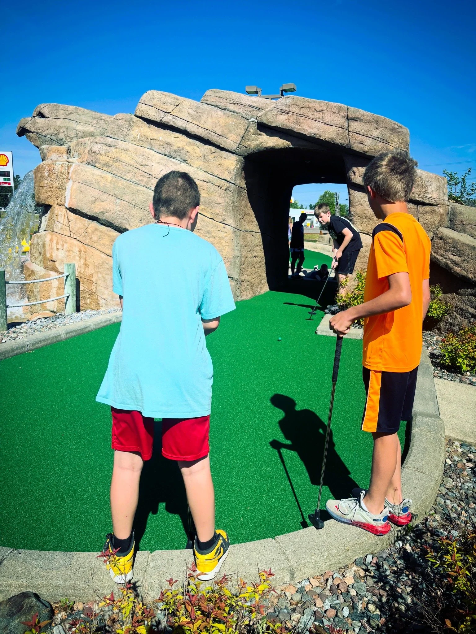 Boys playing Mini Golf.JPG
