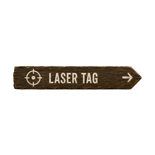 A wooden sign with a target symbol and the text 'LASER TAG' pointing to the right.