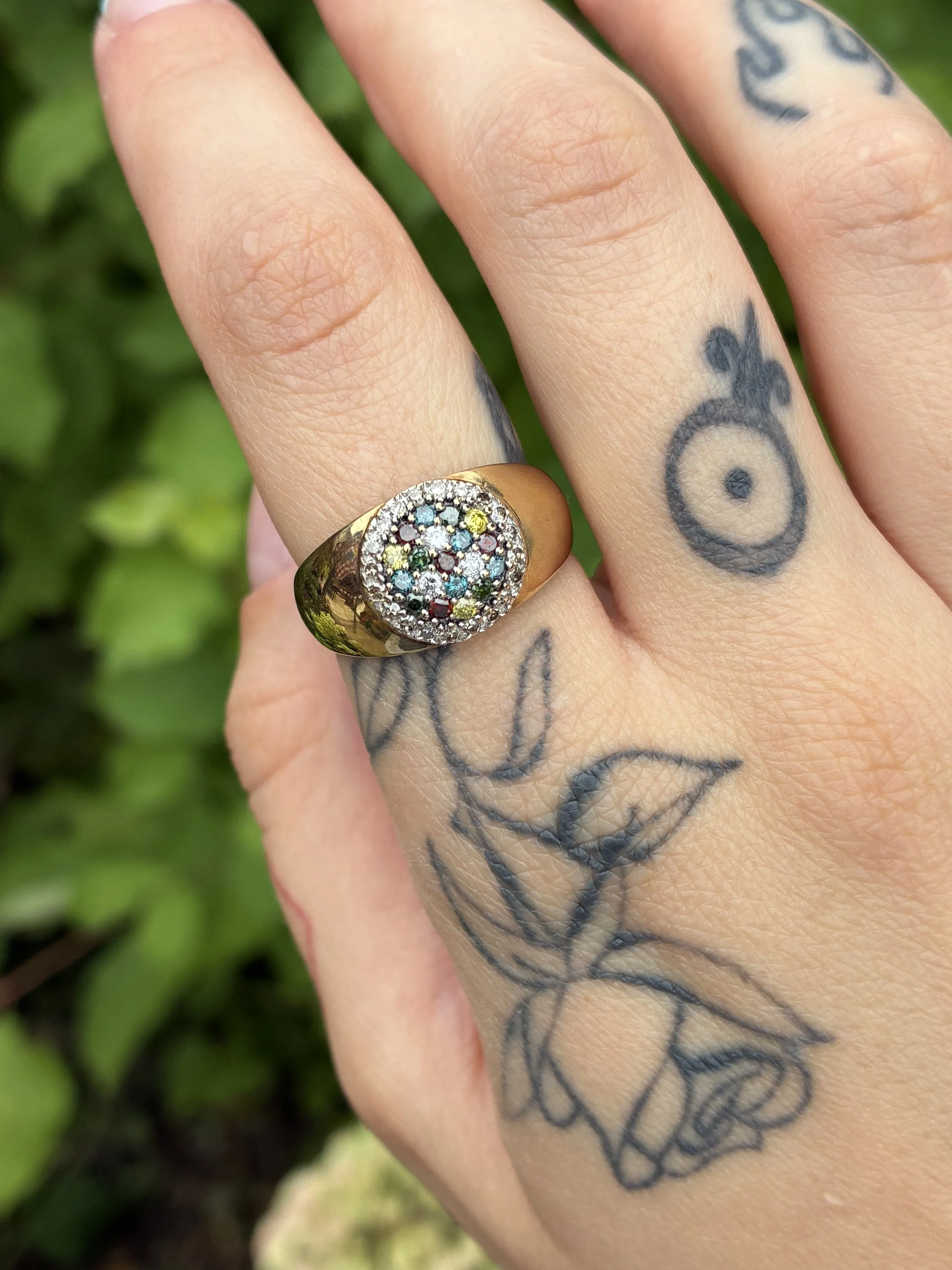 Multicolour diamond ring on hand