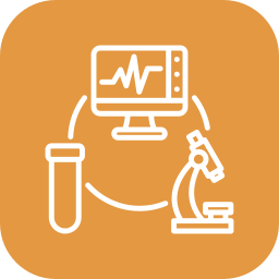 Line graph on computer screen connected to laboratory equipment and a microscope, representing scientific research or medical analysis.