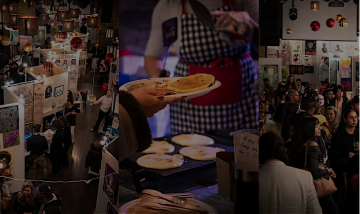 People attending an art fair or gallery, with booths displaying artwork, and a food vendor serving pancakes.