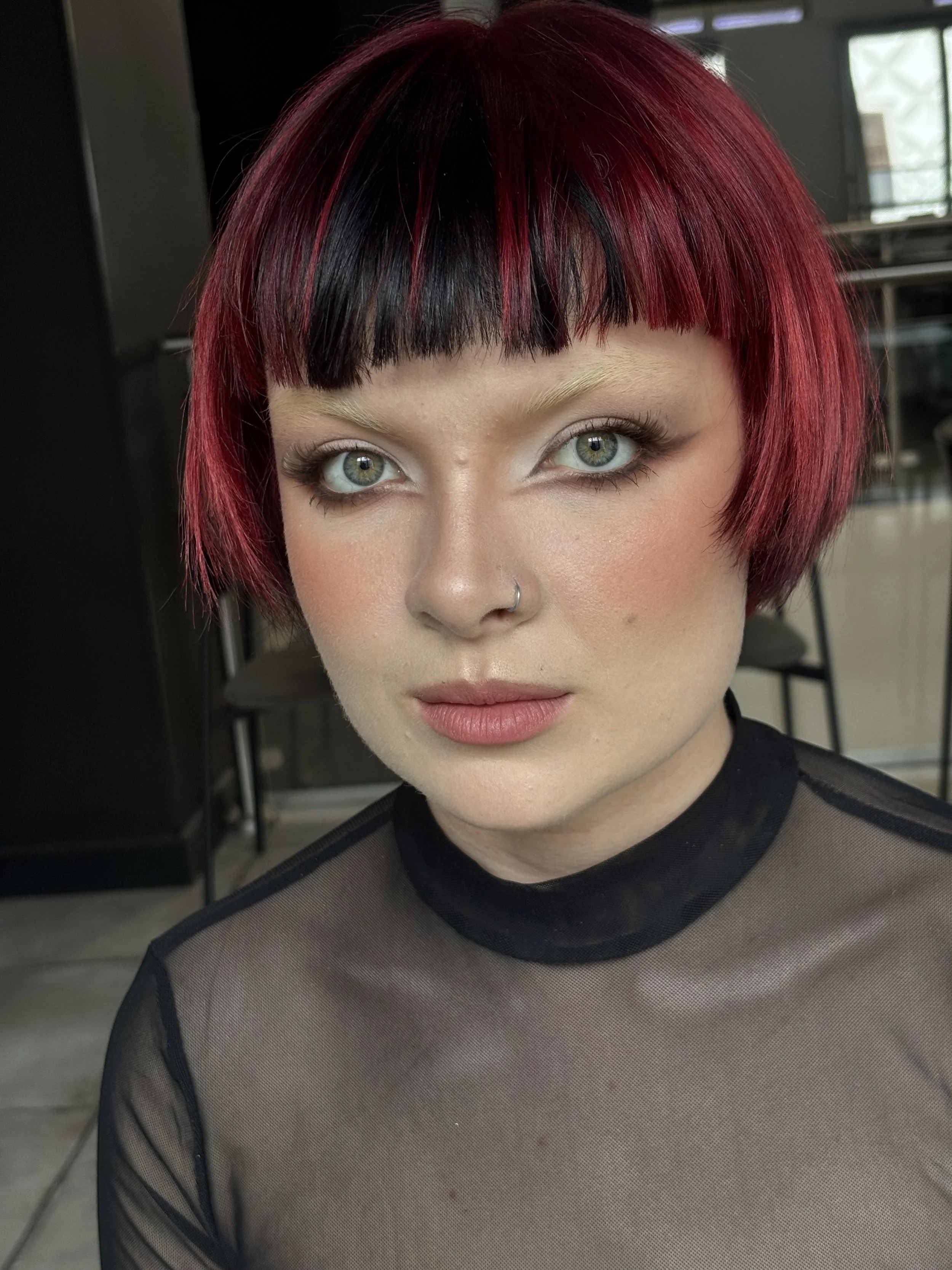 Editorial look created by Kinga Makeup Art for L'oreal Regional Final in Leeds showcasing graphic liner and rosy cheeks. Skin‑focused makeup with warm undertones and soft glow.