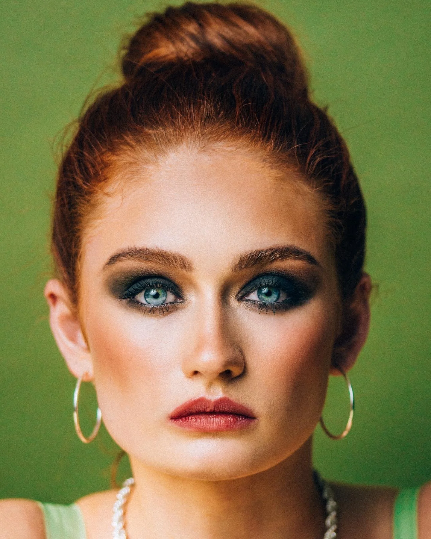 Smokey eye with sculpted features and refined skin work. Editorial beauty by Kinga for commercial and beauty imagery